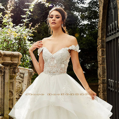 Beaded Crystal Shiny Princess Ball Gown Wedding Dress Robe De Mariee Boheme Short Sleeve See Through Illusion Bridal Dresses